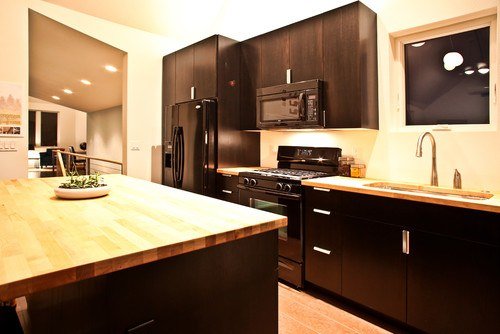 Black kitchen deals cabinets wood countertops