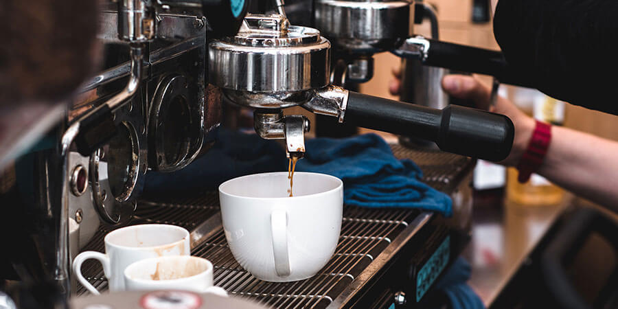 Cleaning a coffee deals machine