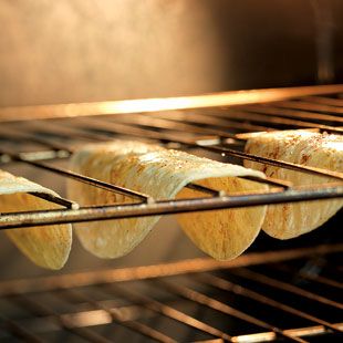Hack #12: Make crunchy taco shells from tortillas with your oven rack